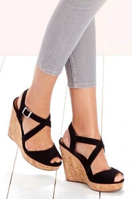 Black strappy platform wedges with a cork heel and peep toe